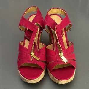 LIGHTLY USED - Michael Kors red Berkley Wedge with gold zipper